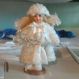 Porcelain child girl doll.